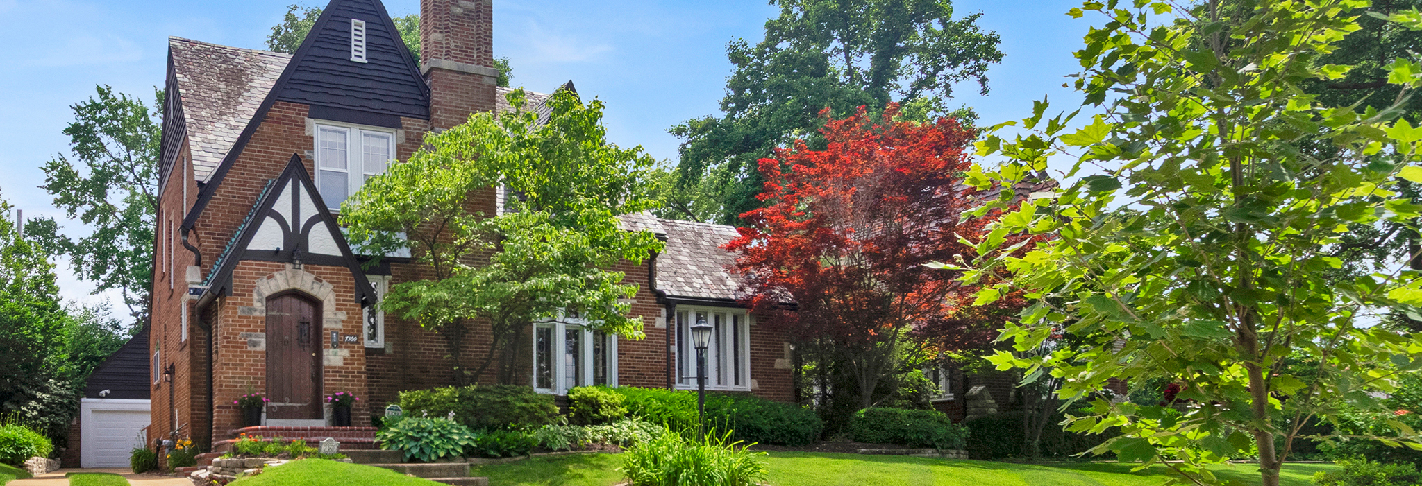 7360 Teasdale Avenue | Exquisite Tudor Home